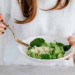 Who should eat less spinach?