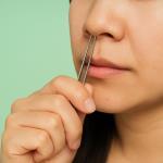 Why is plucking nose hairs potentially dangerous for your health?