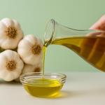 Why did grandmothers carefully preserve garlic oil